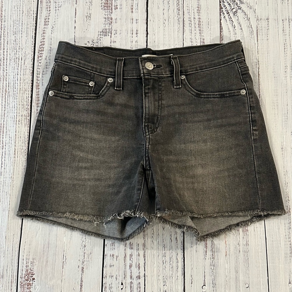 💥2/$15💥Levi’s Black Denim Women's Shorts Size 26. Distressed hem. Red Tab.